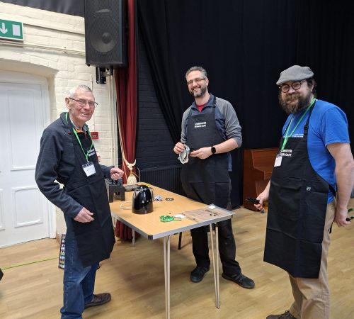 1000007146 Repairers sporting their smart new aprons