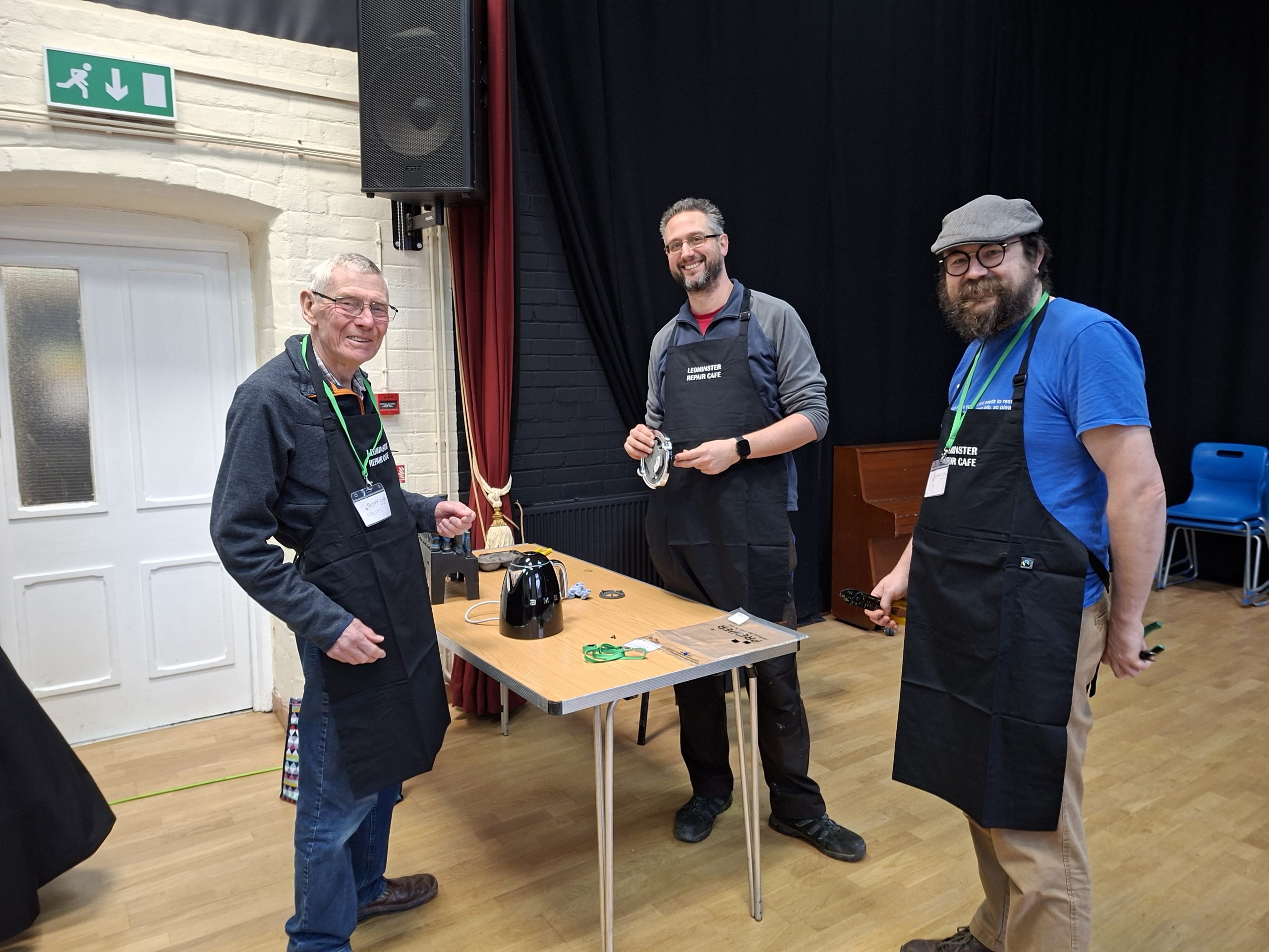 1000007146 Repairers sporting their smart new aprons